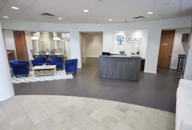 Reception area with seating area and desk at Legacy Healing Center’s Cincinnati drug and alcohol rehab