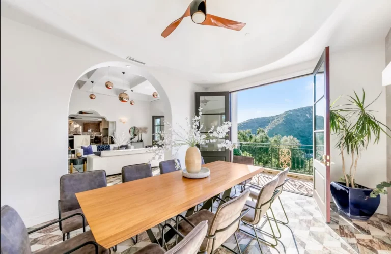 Dining room with modern, California coastal aesthetic that has canyon views and seating for eight at Legacy's drug and alcohol rehab in Los Angeles