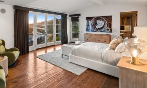 Legacy Healing Center, Wattles - The image depicts a serene private room in a luxury treatment center, featuring comfortable bedding and ample natural light, ideal for individuals seeking addiction treatment and support during their recovery journey. This inviting space emphasizes the importance of personalized treatment plans in a peaceful environment conducive to healing.