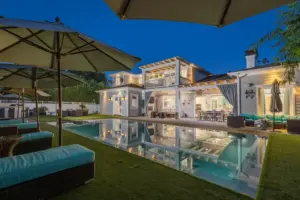 Luxury addiction treatment center with private pool, outdoor seating, and resort-style recovery environment