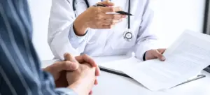 A visual representation of personalized treatment plans for substance use, featuring a doctor and patient reviewing an substance abuse treatment plan.