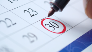 The image depicts a calendar with several dates marked off, illustrating the progression of time during the withdrawal process when detoxing off Adderall. It symbolizes the journey through common withdrawal symptoms such as mood swings, sleep disturbances, and increased appetite, highlighting the importance of medical support and ongoing care during this challenging period.